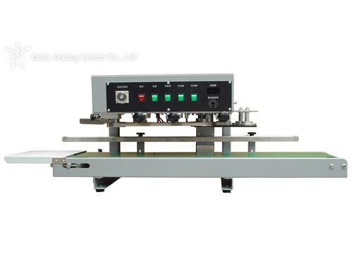 Tabletop vertical rotary sealer